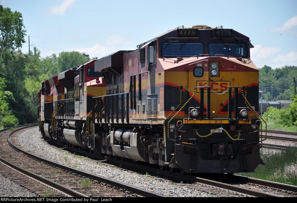 Paused northbound grain train holds the main